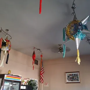 Piñatas in a Asian establishment.