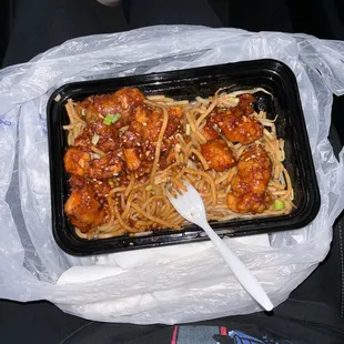 Vegetable lo mein with orange chicken