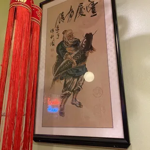 a picture of a man riding a horse