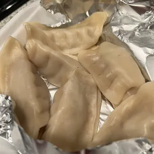 Steamed chicken pot stickers