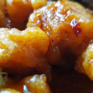 The chicken is small pieces in thick batter