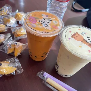 Thai milk tea with pearls. Mango smoothie with pearls. Fortune cookies