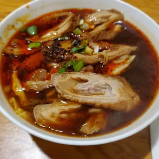 &quot;None spicy&quot; Pork Belly Noodle Soup with extra Large Intestines -- it was still spicy and had no pork belly.