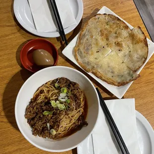 braised egg, scallion pancake, and sichuan mixed noodle