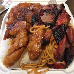 Orange chicken,BBQ Pork, white rice and chowmein.