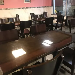 dining area with tables and chairs