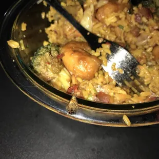 a plate of food with a fork in it