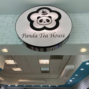 a panda tea house sign