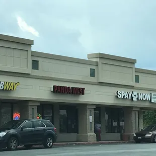 cars parked in front of the store