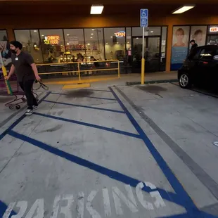 At the front of  Panda Wok.