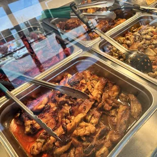 a variety of food items in a buffet