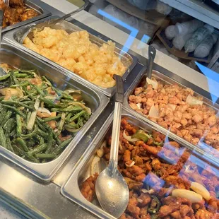 a variety of food items in a buffet