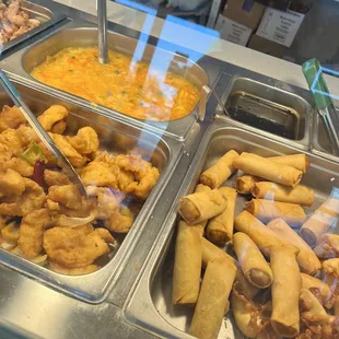 a variety of food items in a buffet