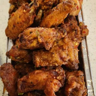 8 orders of spicy wings (tray NOT included, I brought the  tray) perfect for Super Bowl!!