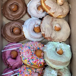 Chocolate glaze, browned butter glaze, cinnamon glaze, blueberry cheesecake, strawberry sprinkle, coconut lime.