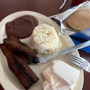 Plantains with rice and beans with a nice piece of cheese and sour cream.  Sooo good!