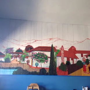 a mural in a restaurant