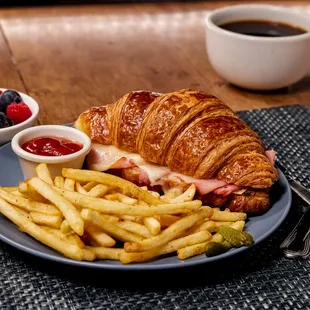 Hand and Cheese Croissant and Fries