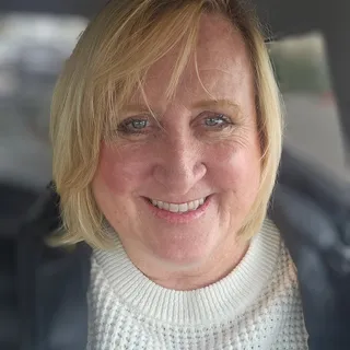 Joy K.