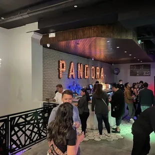 a crowd of people at a party