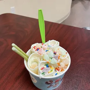Almond almond base with coconut mixed in, mochi, rainbow sprinkles, matcha pocky