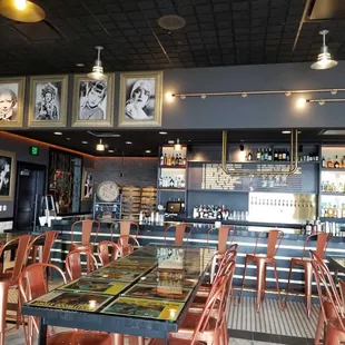 a bar with a lot of chairs