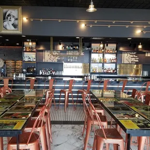 a restaurant with tables and chairs