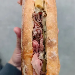 Slow roasted beef, fermented butter, pickled banana peppers, housemade aioli on a house baguette.