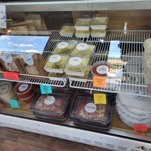 The bottom shelf has lasagna for 2 and chicken parm