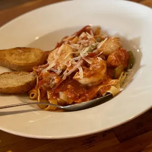 Fra Diavolo Lobster Fettuccini $28.00  Lobster, Shrimp, Scallops, Asparagus, Peppers, Tomato