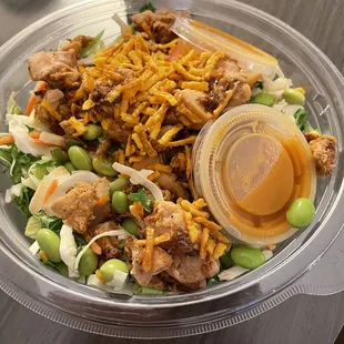 a salad in a plastic container