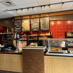 a counter with a variety of baked goods