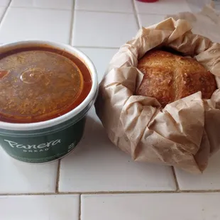 Bread and chili packaged separate to assemble at home.