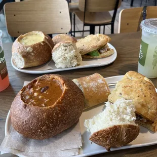 Turkey chili in a bread bowl, chicken avocado sandwich, cream and broccoli soup in a bread bowl. Lemonades to drink