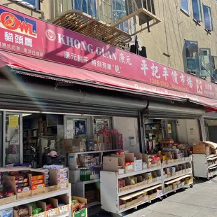 a woman walking past a store