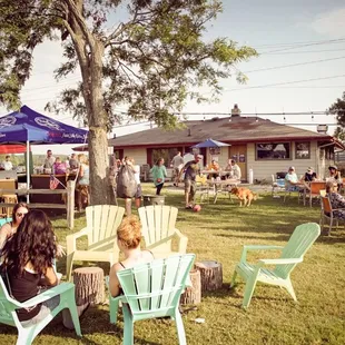 people sitting in lawn chairs
