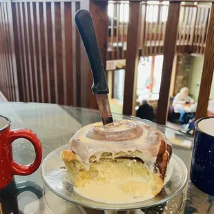 a plate of food and a cup of coffee