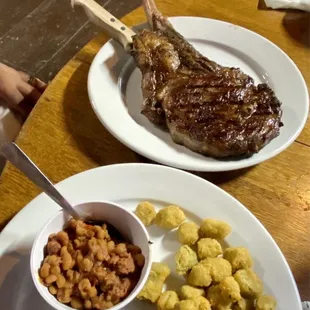 Tomahawk steak, fried okra, and beans
