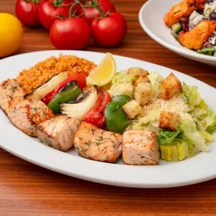 Entree: Atlantic Salmon Kabob with sustainably raised salmon, grilled vegetables, and choice of two sides.