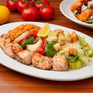 Entree: Atlantic Salmon Kabob with sustainably raised salmon, grilled vegetables, and choice of two sides.