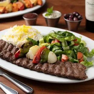 Entree: Beef Koobideh Kabob (all natural, antibiotic and hormone free beef) with choice of two sides.