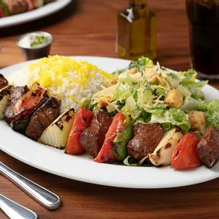 Entree: Flat Iron Steak Kabob (all natural antibiotic &amp; hormone-free) with grilled vegetables and choice of two sides.