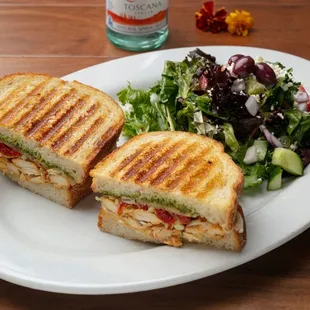 Chicken Pesto Panini: Made to order with ABF chicken, artichoke hearts, provolone cheese and homemade pesto.