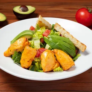 Romaine Avocado Salad: Tossed to order with fresh ingredients and homemade lemon vinaigrette.