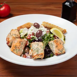 Mediterranean Greek Salad: Tossed to order with fresh ingredients and homemade balsamic vinaigrette.