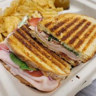 Side view of turkey club grilled panini