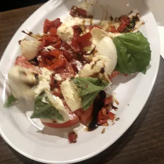 A10 Burrata & Roasted Peppers, cherry tomato & Arugula
