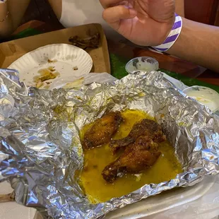 a woman eating chicken