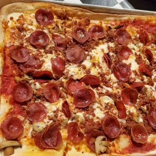 Large Puckstar pizza includes pepperoni, hot crumble sausage, and mushroom.