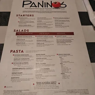 a menu on a checkered table